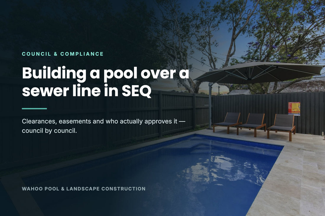 Concrete lap pool built close to a boundary fence in a South-East Queensland backyard, illustrating clearance requirements near underground sewer and water infrastructure
